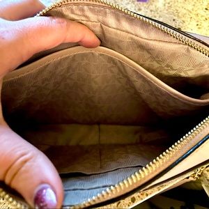 Michael Kors crossbody bag. Gold. Like new. Gently used.